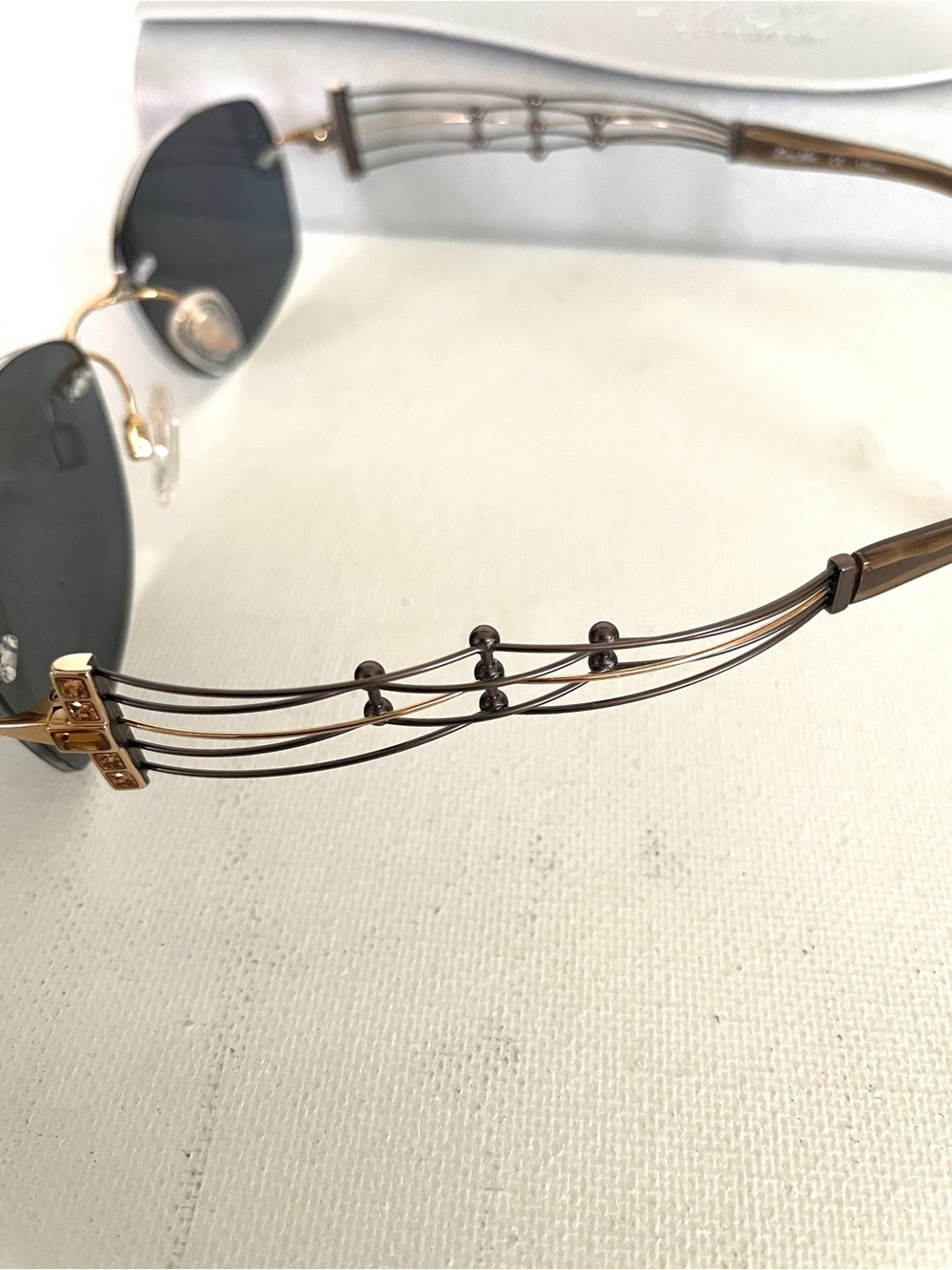 Line Art Charmant Women’s Rimless Black Sunglasses - Picture 3 of 6